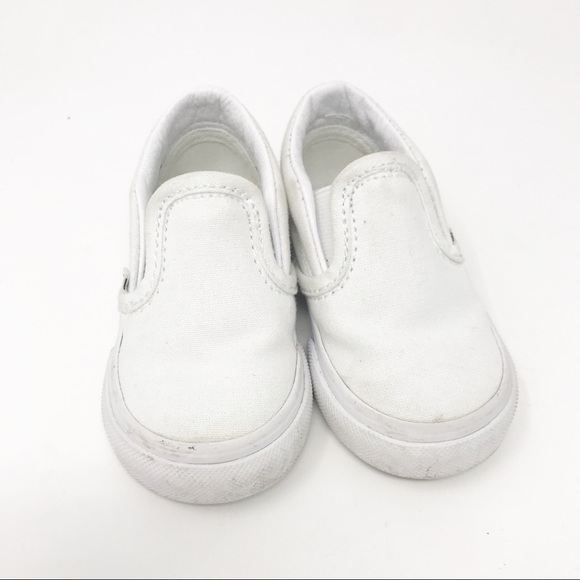 white slip on vans size 4